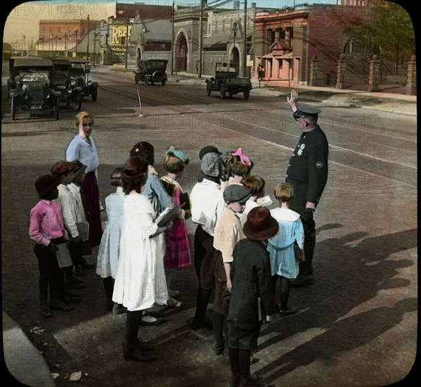 Traffic Policeman with Schoolchildren and Teacher, Cleveland, Ohio, USA, circa 1910's