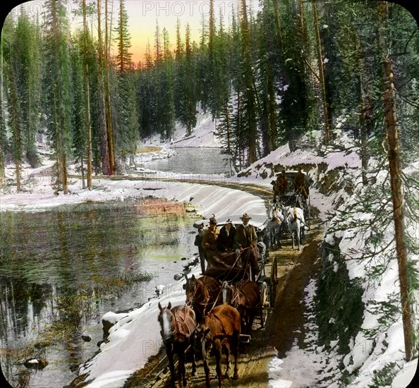 Two Horse-Drawn Carriages along Snowy Trail, Rocky Mountain Divide, Yellowstone National Park, Wyoming, USA, Magic Lantern Slide, circa 1910