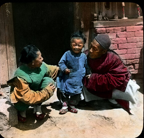 Smiling Child with Parents, Manchuria, China, Magic Lantern Slide, circa 1900