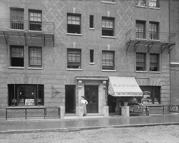 Woman Standing in front of Tenement Building, New York City, New York, USA, Detroit Publishing Company, 1905