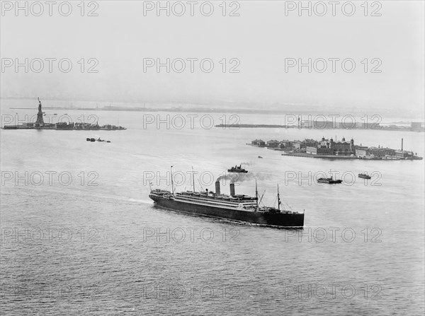 Statue of Liberty, Ellis Island and Ship in Harbor, New York City, New York, USA, Detroit Publishing Company, 1910