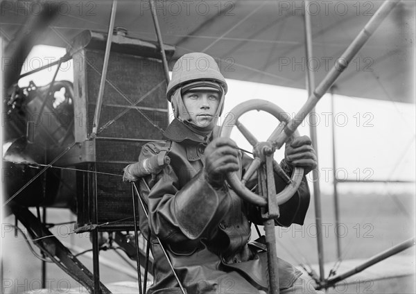 Pilot Testing Single Control of Curtiss Airplane for U.S. Army, College Park, Maryland, USA, Harris & Ewing, 1912
