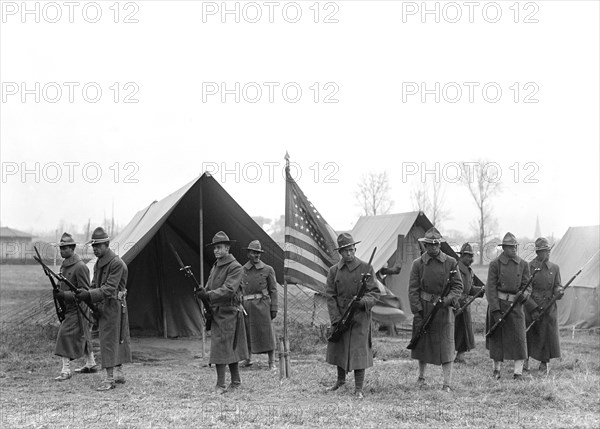 African-American Troops, Portrait Near Tents and American Flag, Harris & Ewing, 1917