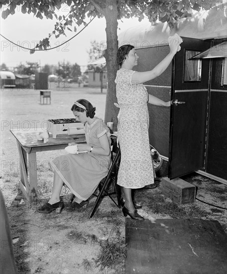 Mother and Daughter Doing Chores at Trailer Camp, Harris & Ewing, June 4, 1937