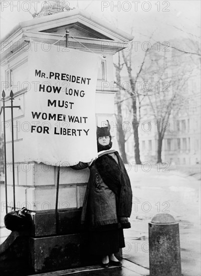 Suffragette Holding Protest Banner "Mr. President How Long Must Women Wait for Liberty?", Washington DC, USA, Harris & Ewing, 1917