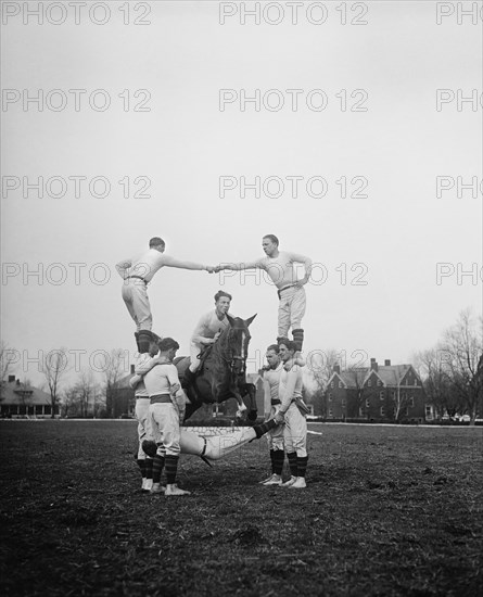 Man on Horse Jumping Through Pyramid of Acrobatic Men, Harris & Ewing, 1931