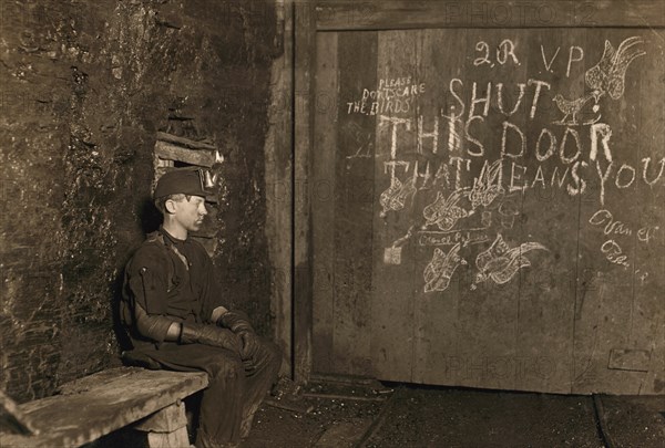 Portrait of 15-year Old Boy Working as Trapper at Coal Mine, His only Job is to Open and Close the Door, West Virginia, USA, Lewis Hine, 1908