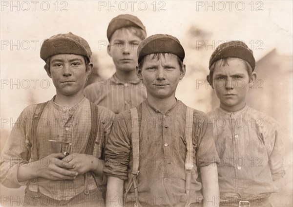 Portrait of Young Boys Working as Doffers at Textile Mill, Macon, Georgia, USA, Lewis Hine, 1909