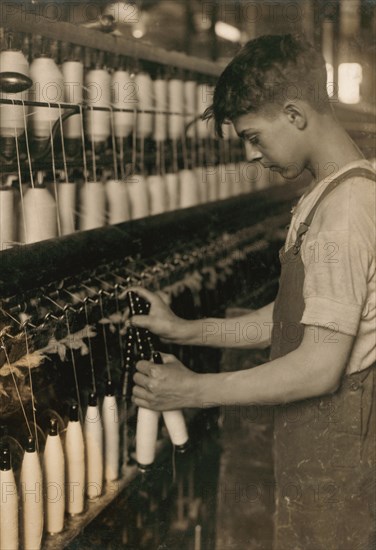 Teen Boy Working as Doffer in Textile Mill, Fall River, Massachusetts, USA, Lewis Hine, 1916