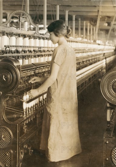 14-year-old Girl Working as Spinner in Cotton Mill, Adams, Massachusetts, USA, Lewis Hine, 1916
