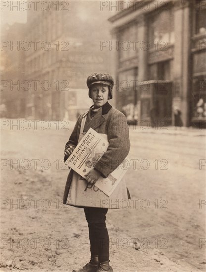 Young Newsboy Selling Newspapers on Street, Rochester, New York, USA, Lewis Hine, 1910