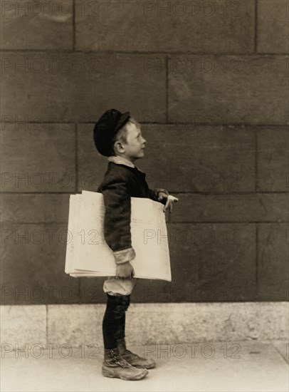 Profile of 5-year-old Newsboy Selling Newspapers on Grand Avenue, Saint Louis, Missouri, USA, Lewis Hine, 1910