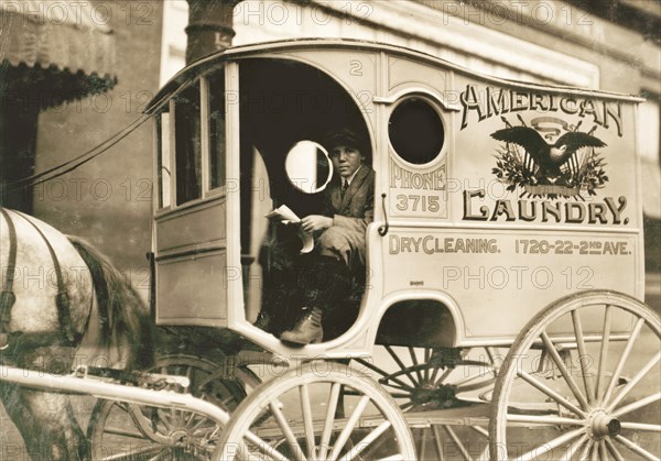 Young Boy Driving Laundry Delivery Wagon, Birmingham, Alabama, USA, Lewis Hine, 1914