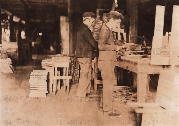Two Young Boys Making Grate Bottoms at Basket Factory, Evansville, Indiana, USA, Lewis Hine, 1908
