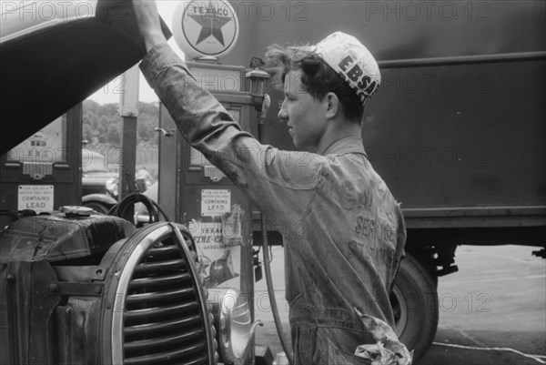 Attendant at Truck Service Station, U.S. 1, Washington DC, USA, Jack Delano for Farm Security Administration, circa 1940