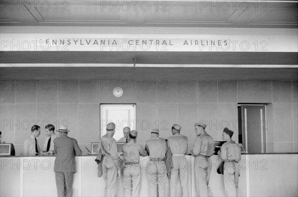 Soldiers at Ticket Counter at Municipal Airport, Washington DC, USA, Jack Delano for Office of War Information, July 1941