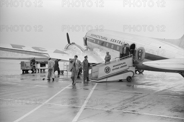 Passengers Leaving Airplane, Municipal Airport, Washington DC, USA, Jack Delano for Farm Security Administration, July 1941