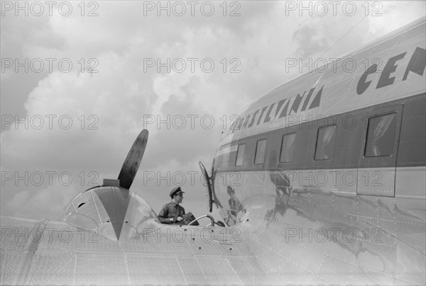 Loading Baggage onto Airplane, Municipal Airport, Washington DC, USA, Jack Delano for Farm Security Administration, July 1941