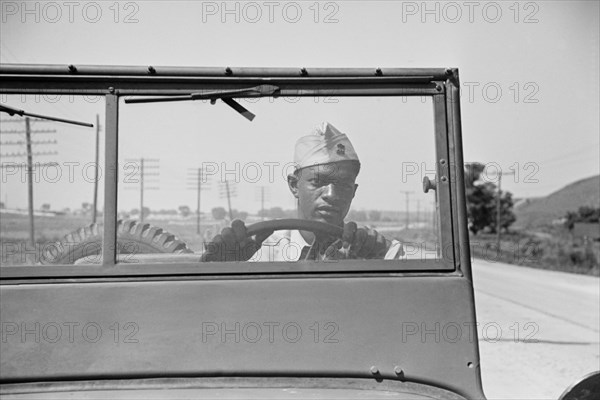 Driver of Jeep of a Reconnaissance Unit, Fort Riley, Kansas, USA, Jack Delano for Office of War Information, April 1942