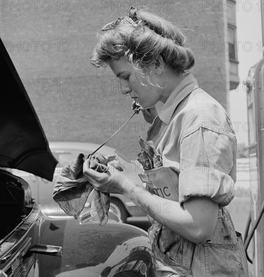 Miss Natalie O'Donald, a Garage Attendant at the Atlantic Refining Company Garages, Close-Up, Philadelphia, Pennsylvania, USA, Jack Delano for Office of War Information, June 1943