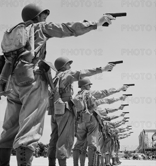 Enlisted Men Learning to Shoot Pistol, Air Service Command, Daniel Field, Georgia, USA, Jack Delano for Office of War Information, July 1943