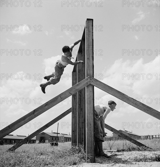 Enlisted Men Going Through Obstacle Course, Air Service Command, Daniel Field, Georgia, USA, Jack Delano for Office of War Information, July 1943