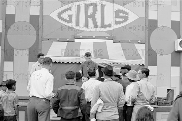 Ticket Seller at Carnival, Brownsville, Texas, USA, Arthur Rothstein for Farm Security Administration, February 1942