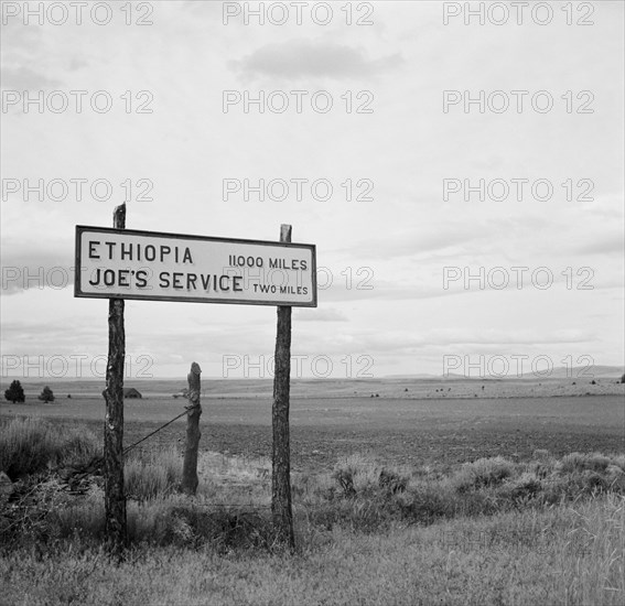 Sign on Highway near Madras, Oregon, USA, Arthur Rothstein for Farm Security Administration, July 1936