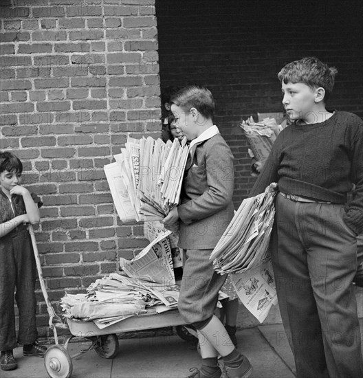 Boys Bringing Their Weekly Contribution of Scrap Paper to School during Scrap Salvage Campaign, Victory Program, Washington DC, USA, Marjorie Collins for Office of War Information, August 1942