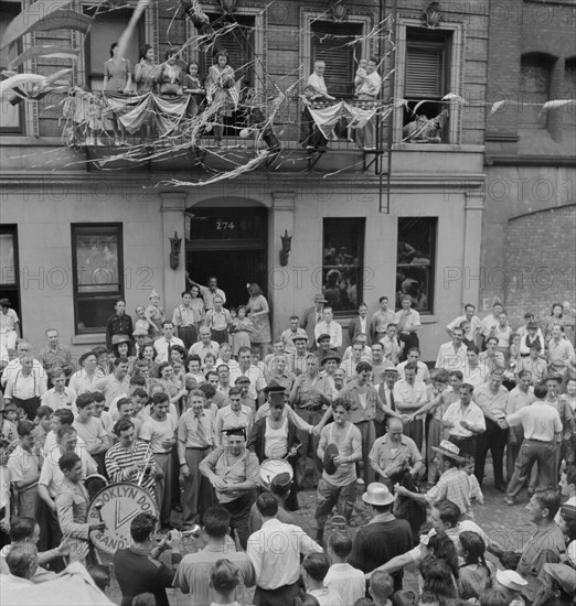 Dancing and Music on Mott Street at Flag Raising Ceremony in Honor of Neighborhood Boys in the U.S. Army, New York City, New York, USA, Marjorie Collins for Office of War Information, August 1942