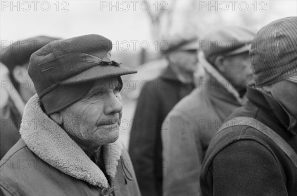 Farmers at Country Auction, near Aledo, Mercer County, Illinois, USA, Russell Lee, November 1936