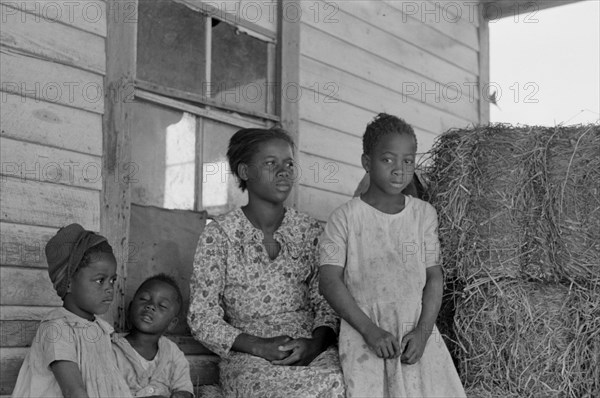 Sharecropper Family on Cabin Porch, New Madrid County, Missouri, USA, Russell Lee, May 1938