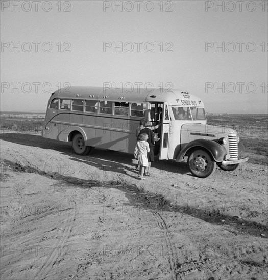 Children Getting on School Bus, Dead Ox Flat, Malheur County, Oregon, USA, Dorothea Lange for Farm Security Administration, October 1939