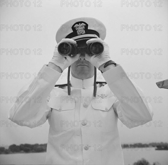 Naval Officer Looking Through Binoculars, Anacostia, Washington DC, USA, John Collier for Office of War Information, August 1941