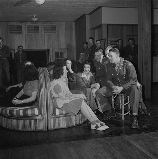 Break during Bi-Weekly "Open House" Dance, Main Lounge of Idaho Hall, Arlington Farms, a Residence for Women who work in Government during War, Arlington, Virginia, Esther Bubley for Office of War Information, USA, June 1943