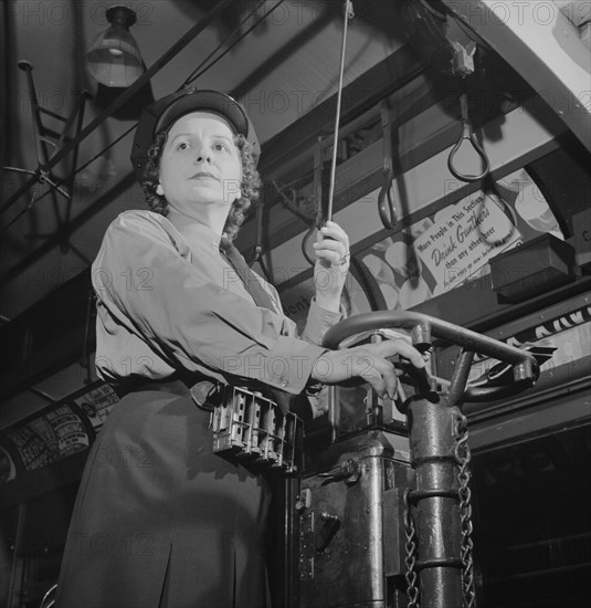 Female Streetcar Conductor, Capitol Transit Company, Washington DC, USA, Esther Bubley for Office of War Information, June 1943