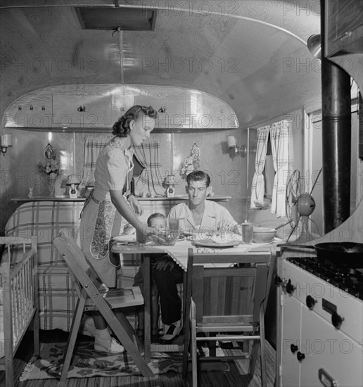 Family in Trailer Home at Glenn L. Martin Trailer Village, a Farm Security Administration (FSA) Housing Project, Middle River, Maryland, USA, John Collier for Office of War Information, August 1943