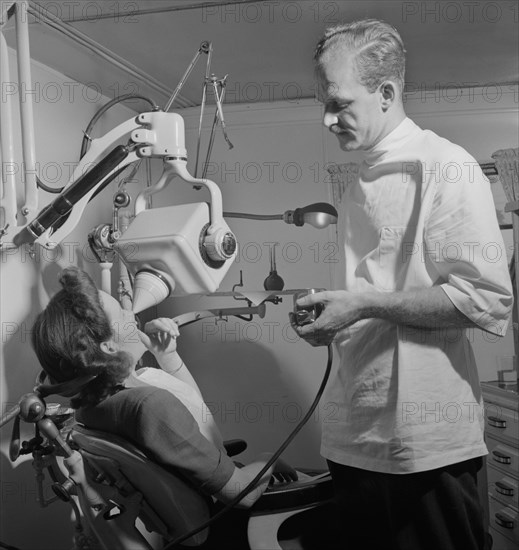 Dentist at Glenn L. Martin Trailer Village, a Farm Security Administration (FSA) Housing Project, Middle River, Maryland, USA, John Collier for Farm Security Administration, August 1943