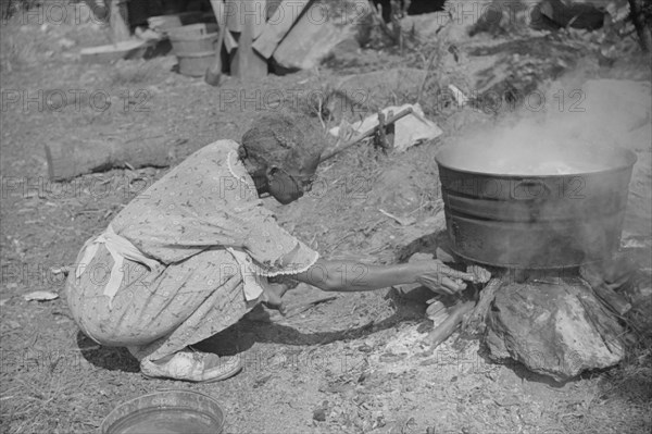 Woman Washing Clothes outside of Shack Along River, West Virginia, USA, Marion Post Wolcott for Farm Security Administration, September 1938