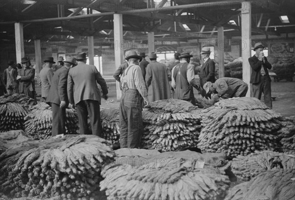 Farmers at Tobacco Auction, Durham, North Carolina, USA, Marion Post Wolcott for Farm Security Administration, November 1939