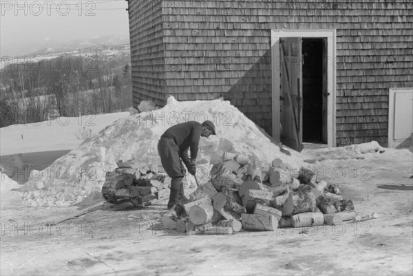 Man Splitting Wood for Winter Fuel, Lisbon, New Hampshire, USA, Marion Post Wolcott for Farm Security Administration, March 1940