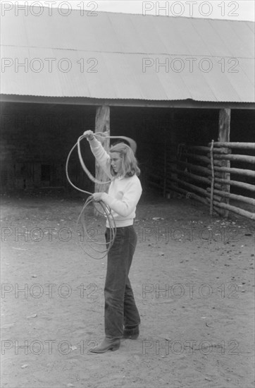 Teen Girl Learning how to Throw a Rope, Brewster Arnold Circle U Ranch, Birney, Montana, USA, Marion Post Wolcott for Farm Security Administration, August 1941