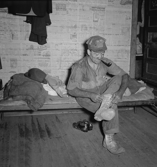 Coal Miner Smoking Pipe after Coming Home from Work, Chaplin, West Virginia, USA, Marion Post Wolcott for Farm Security Administration, September 1938