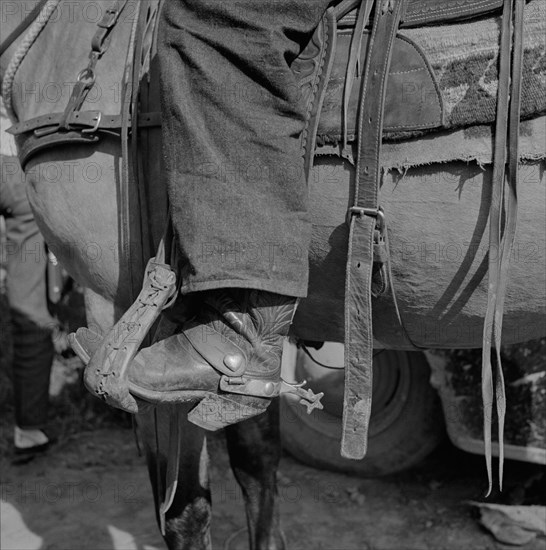 Detail of Cowboy's Boot and Spur in Stirrup at Rodeo, Ashland, Montana, Marion Post Wolcott for Farm Security Administration, July 1941