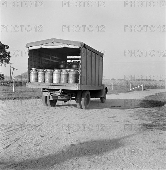 Milk Truck Leaving Two Rivers Non-Stock Cooperative Association, a Farm Security Administration (FSA) Project, Waterloo, Nebraska, USA, Marion Post Wolcott for Farm Security Administration, September 1941