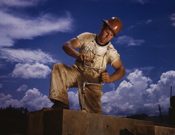 Carpenter Working on TVA's Douglas Dam, French Broad River, Sevier County, Tennessee, USA, Alfred T. Palmer for Office of War Information, June 1942