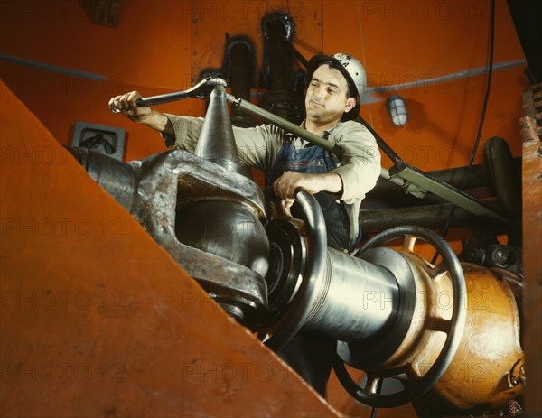 Worker Tightening Nut at TVA Hydroelectric Plant, Watts Bar Dam, Tennessee, USA, Alfred T. Palmer for Office of War Information, June 1942