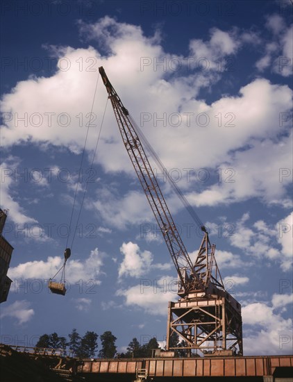 Early Construction with Crane of Douglas Dam, Tennessee Valley Authority, Tennessee, USA, Alfred T. Palmer for Office of War Information, June 1942