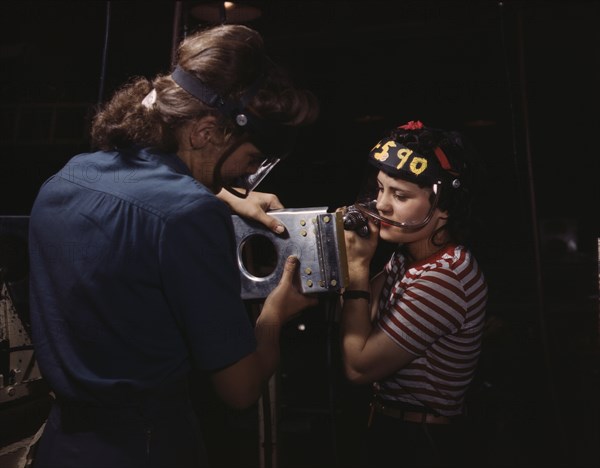 Two Female Workers Assembling Section of Wing for P-51 Fighter Plane, North American Aviation, Inc, Inglewood, California, USA, Alfred T. Palmer for Office of War Information, October 1942