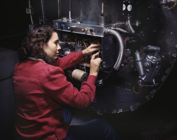 Female Worker Assembling Switch Boxes on Firewalls of B-25 Bomber, North American Aviation, Inc, Inglewood, California, USA, Alfred T. Palmer for Office of War Information, October 1942